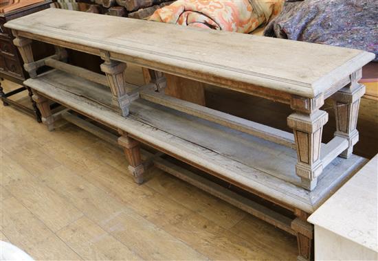 A pair of oak benches W.249cm